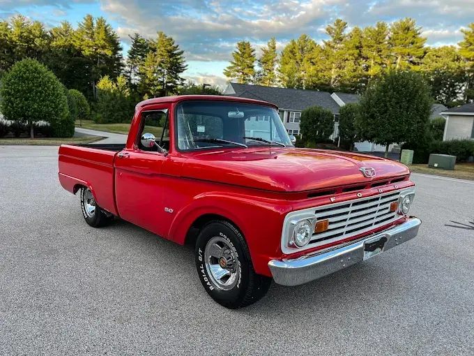Red classic Ford pickup after professional detailing by Midnight Detailing