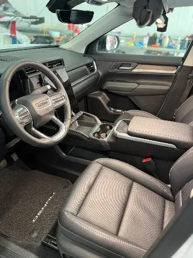 The same vehicle interior after professional detailing by Midnight Detailing in Newton, New Hampshire