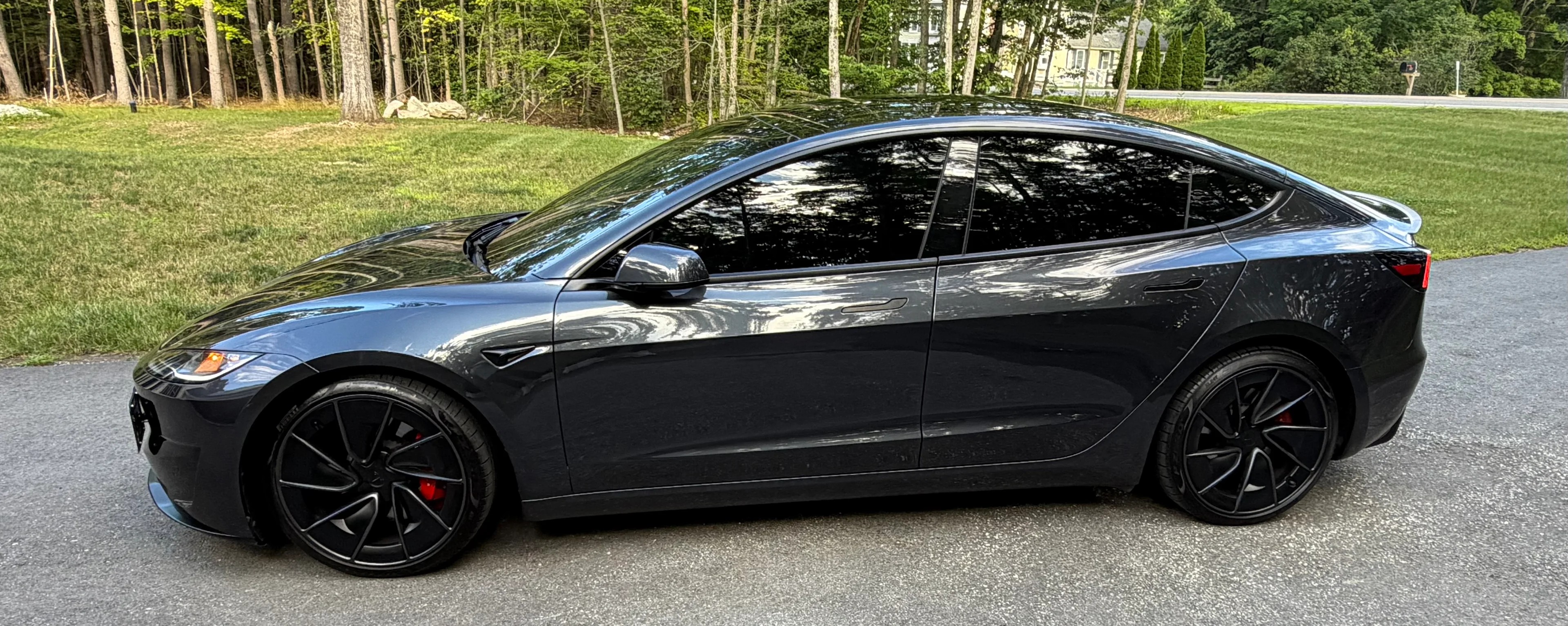 Side view of Tesla Model 3 Performance after ceramic coating in Newton, NH